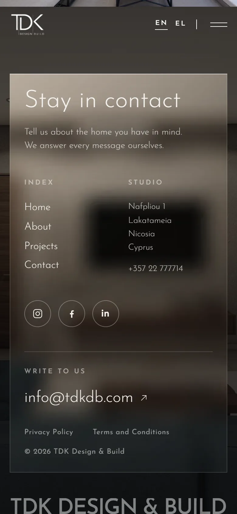 The TDK Design & Build website on a phone